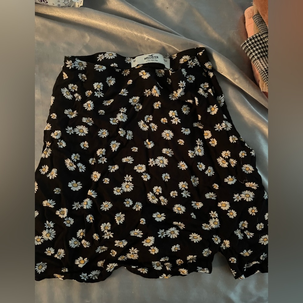 Extra small black skirt with flowers on it